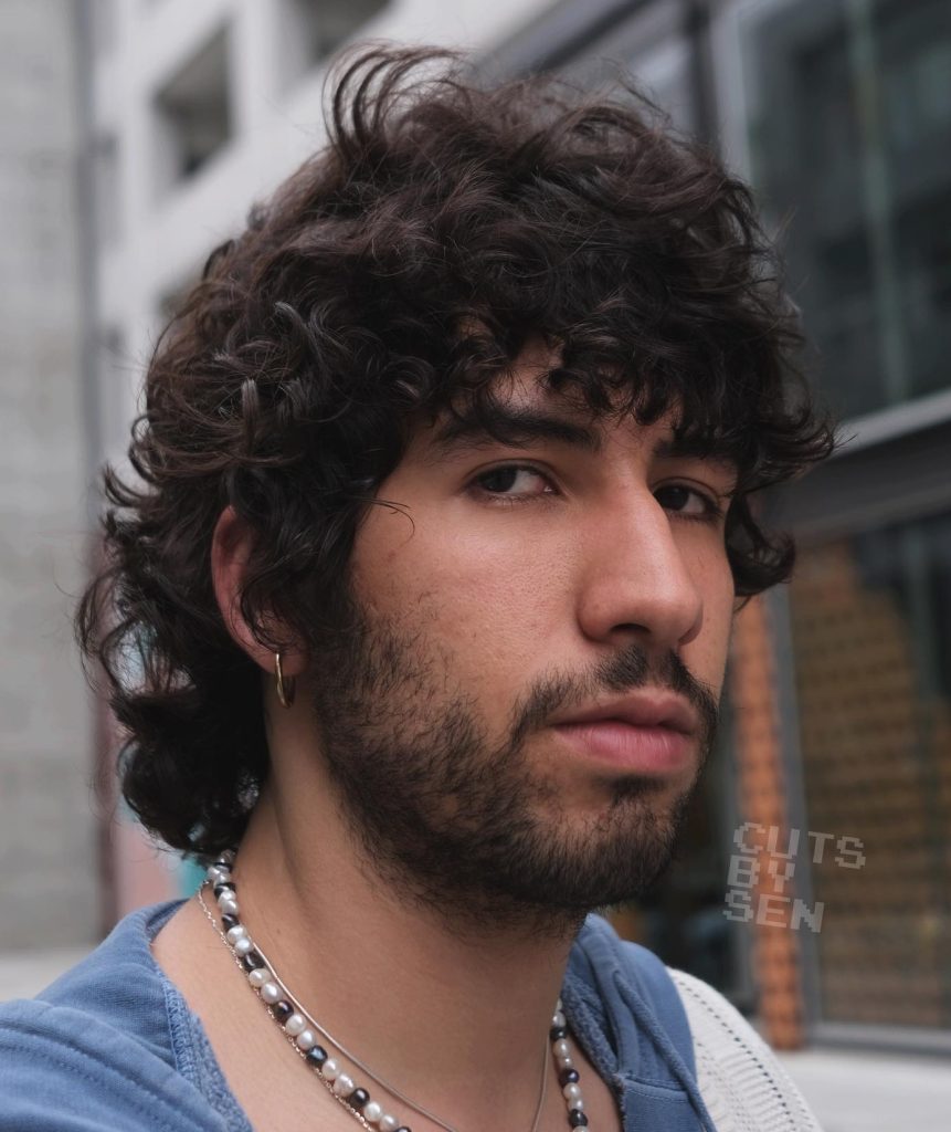 Buzzing long hairstyles for curly hair men for natural hair