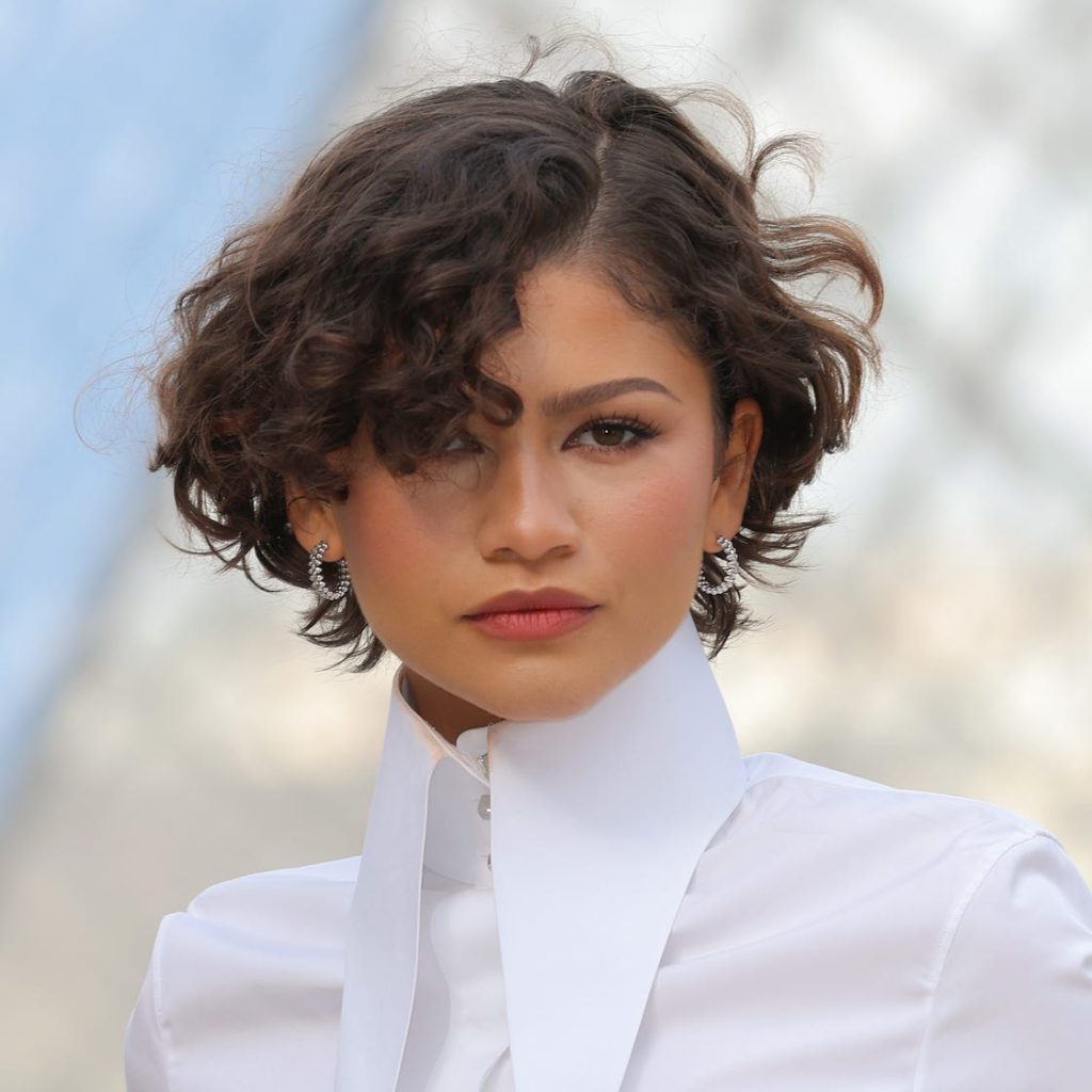 Must-see short hairstyles for curly hair over 60 with glasses