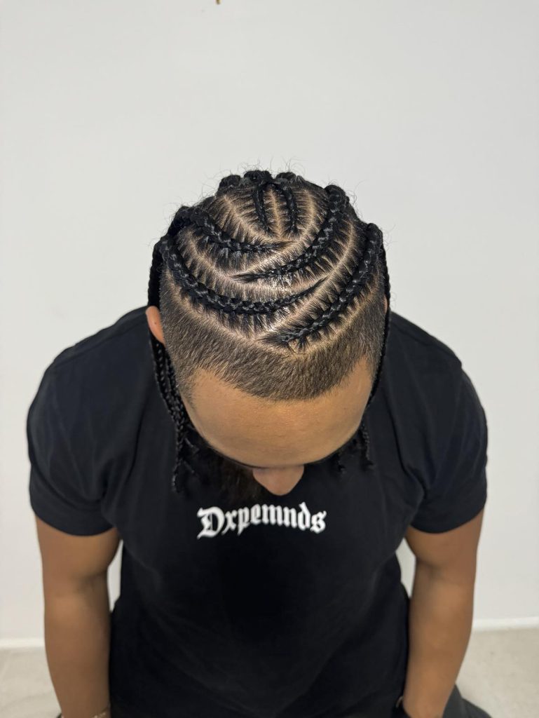 Artful pompadour for with braids hairstyles men