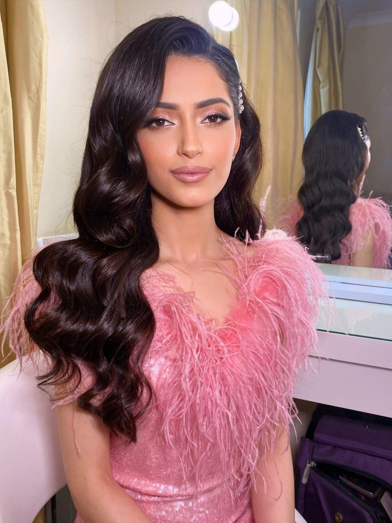 Soft black hairstyles for wedding guest look