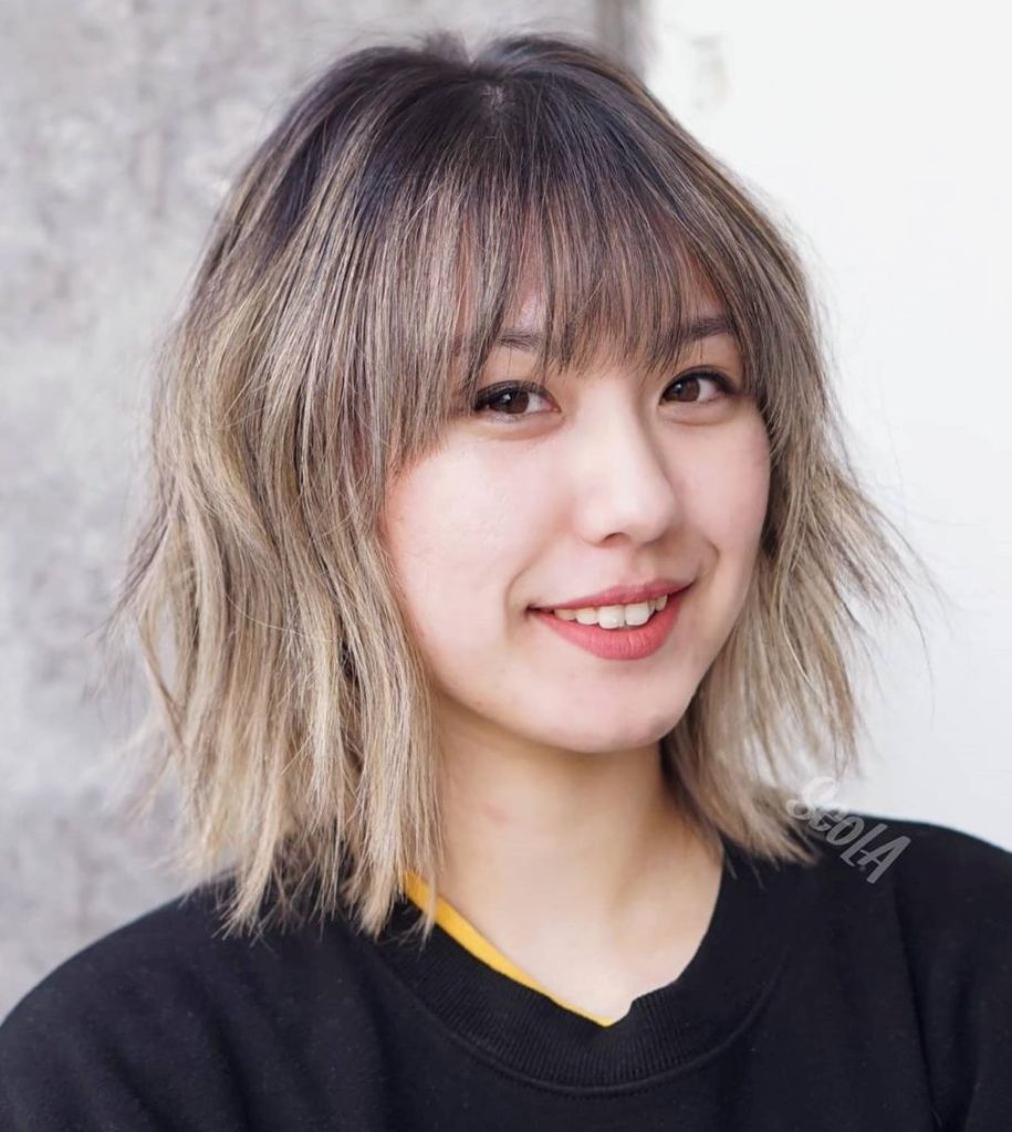 Remarkable short hairstyles for round faces over 60