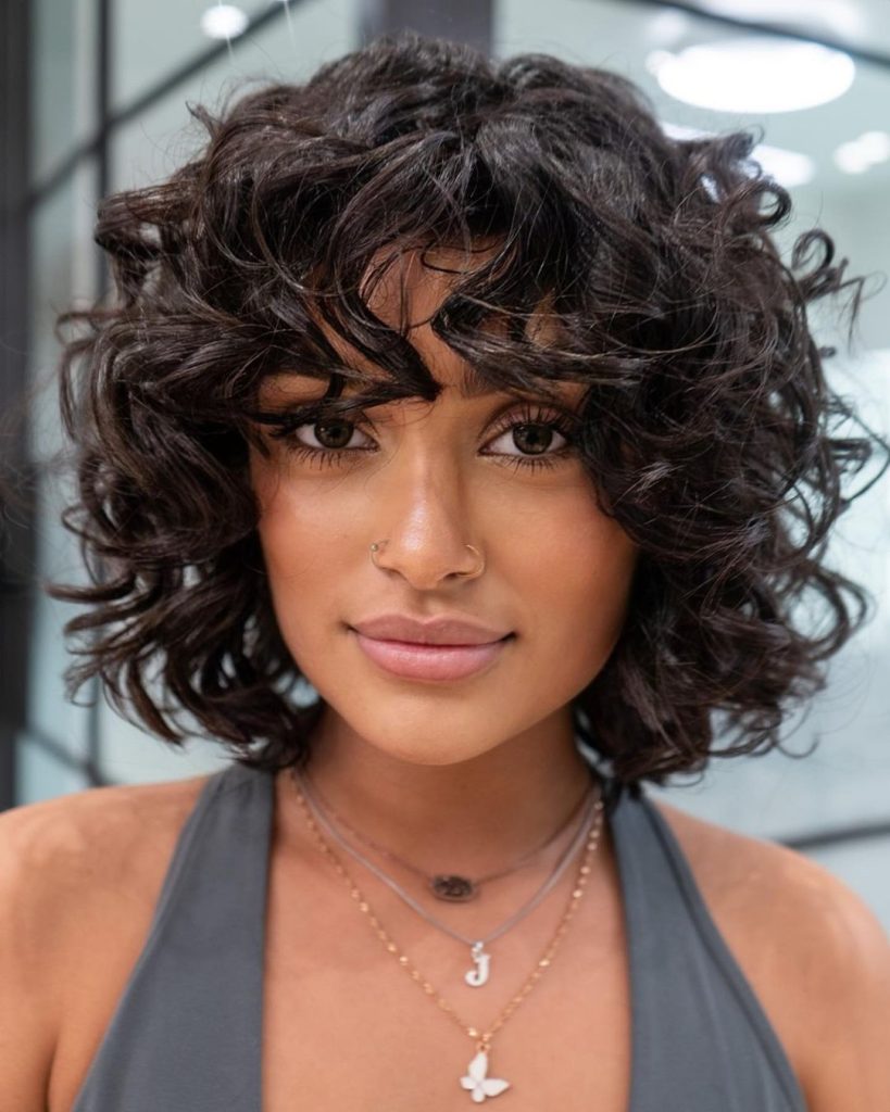 Heartfelt short hairstyles for women for curly hair with bangs